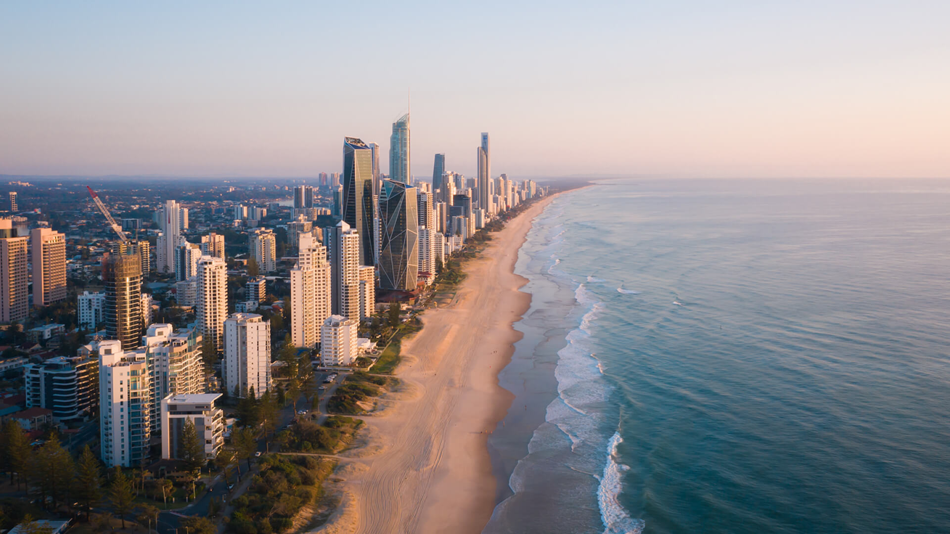 Areal shot of the Gold Coast at sunrise with all of Broadbeach and Surfers paradise visible