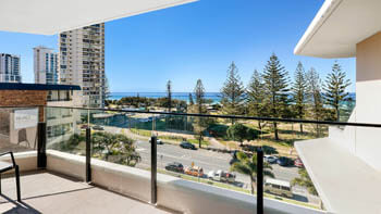 Private balcony overlooking parklands and the ocean at ULTIQA Beach Haven on Broadbeach.