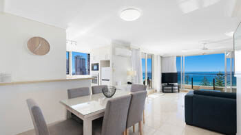 Coastal-style living area with full ocean views at ULTIQA Beach Haven on Broadbeach.