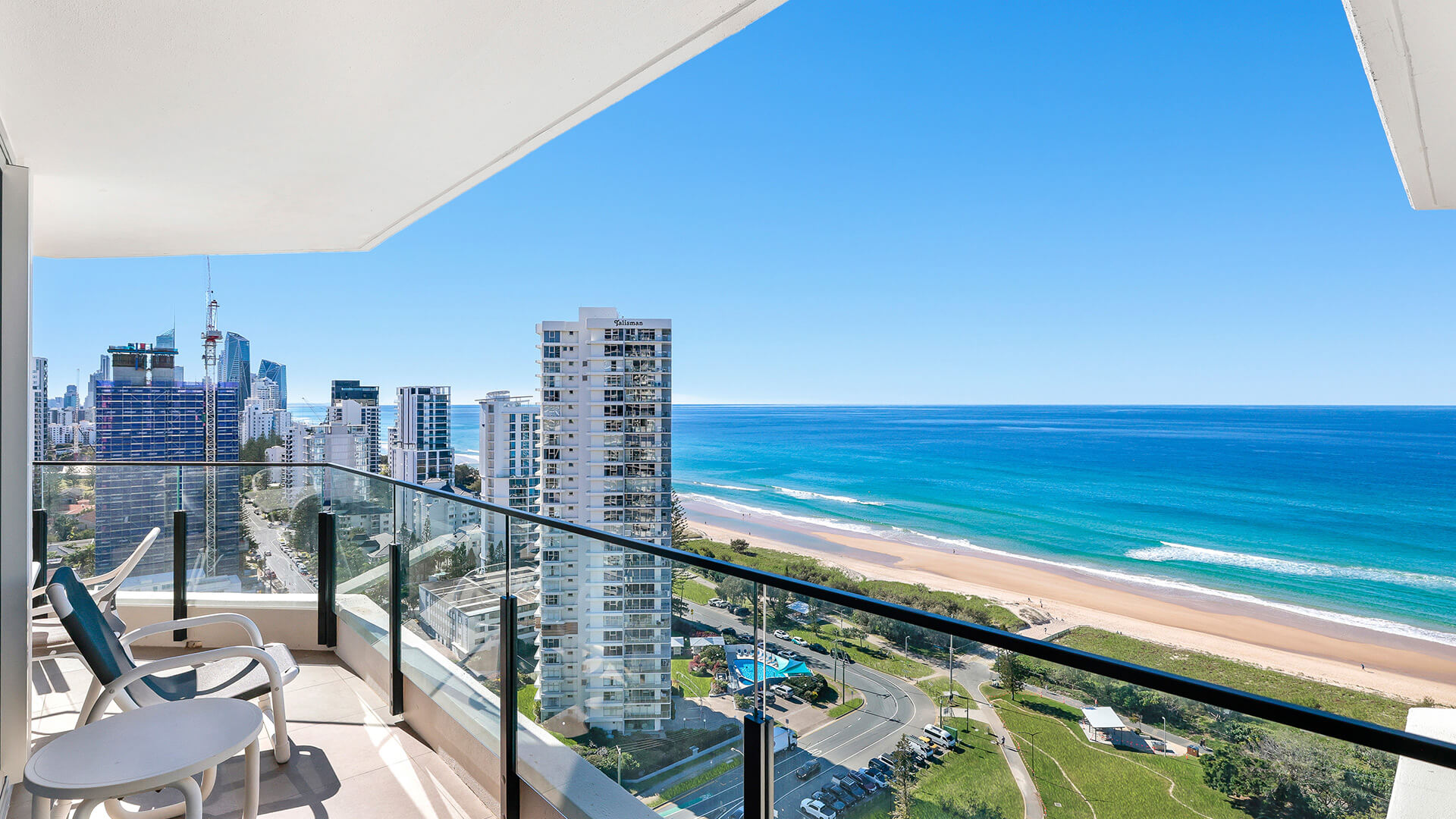 Ocean-view balcony seating overlooking Surfers Paradise beach at ULTIQA Beach Haven on Broadbeach, Gold Coast.