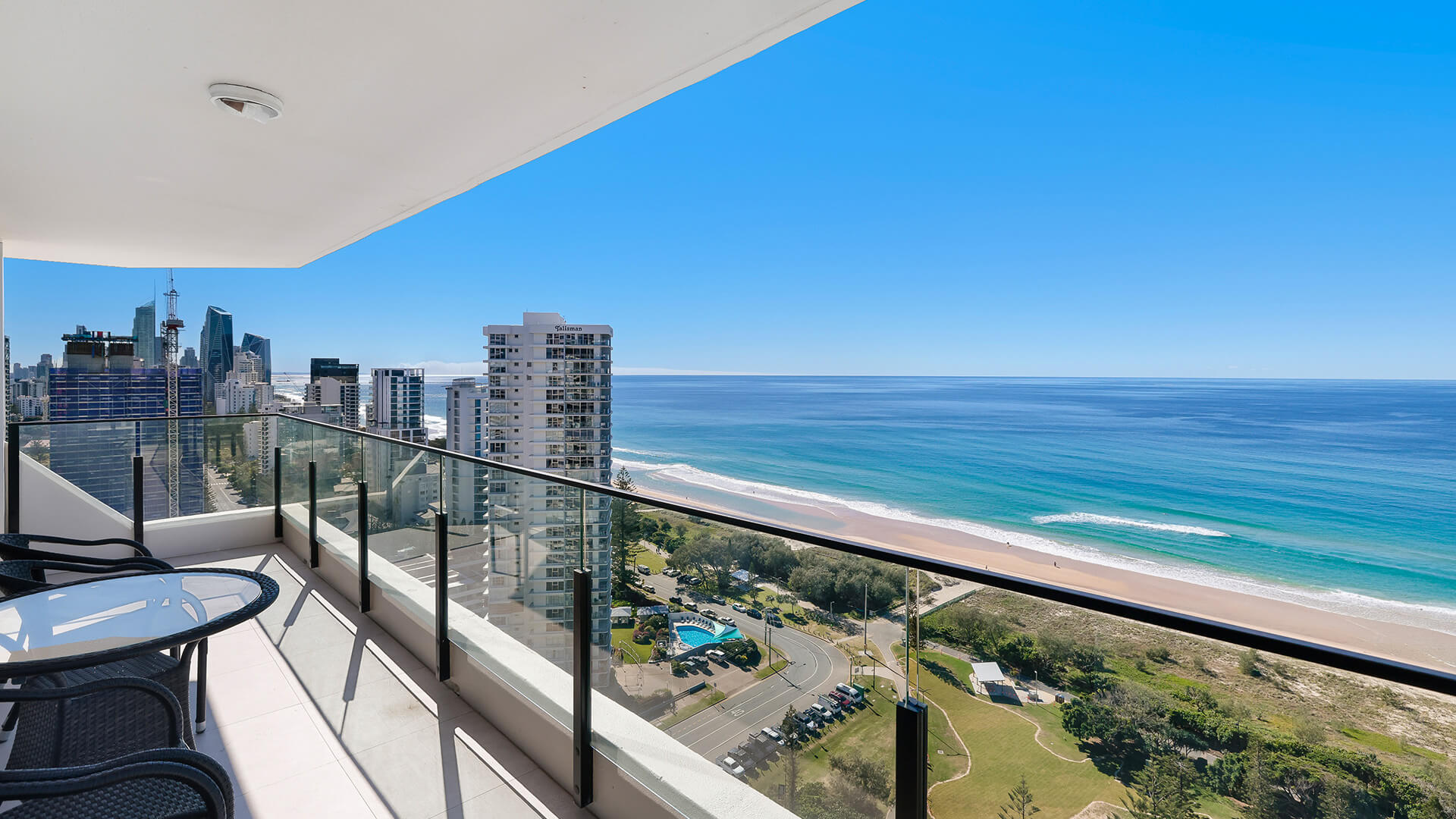 Balcony outlook over Surfers Paradise skyline and beach at ULTIQA Beach Haven on Broadbeach, Gold Coast holiday apartment.