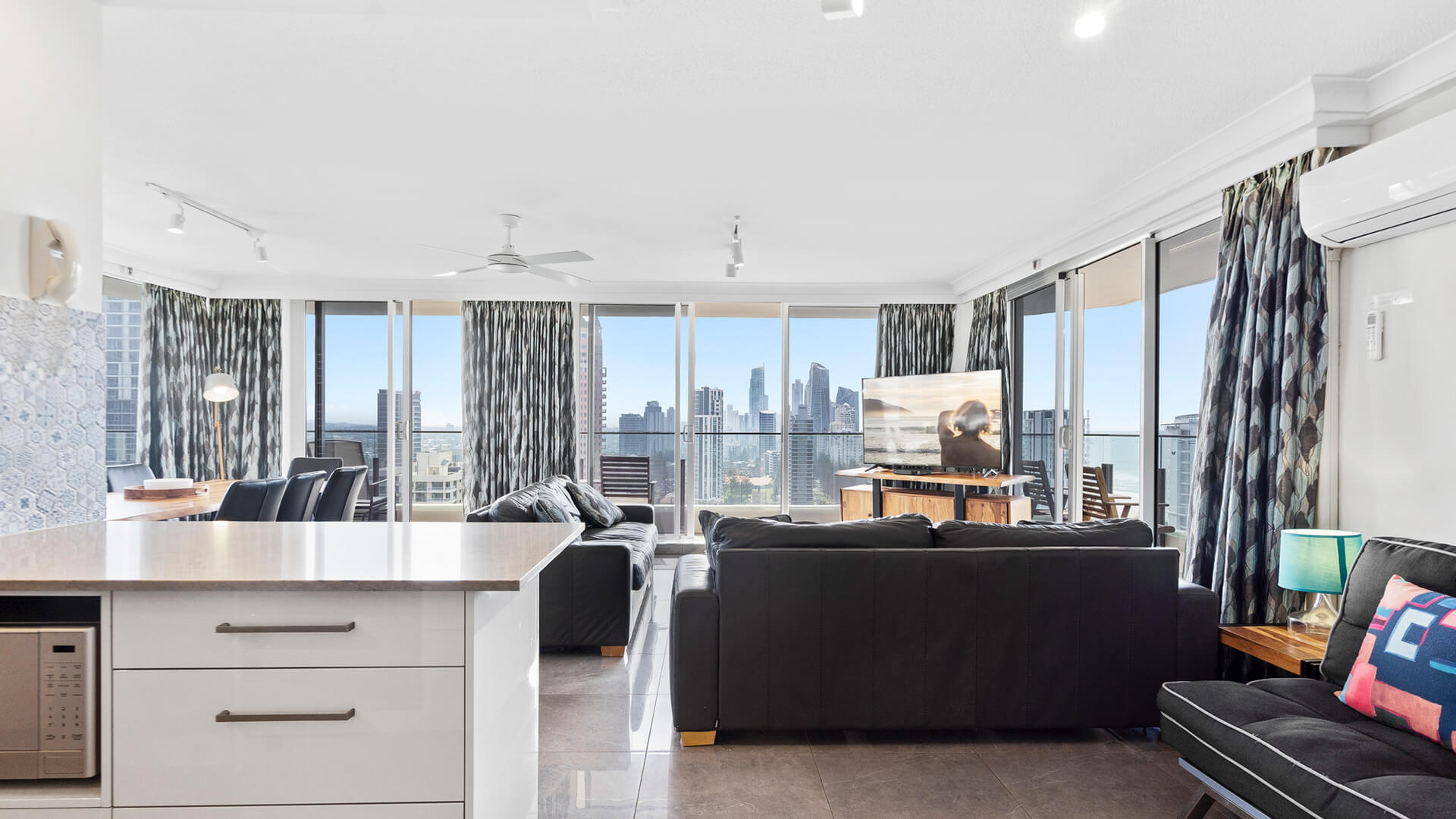 Living room with a view of Gold coast at ULTIQA Beach Haven on Broadbeach.