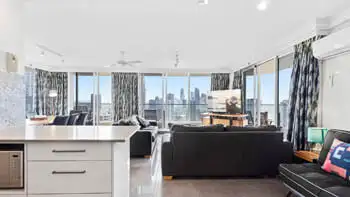 Living room with a view of Gold coast at ULTIQA Beach Haven on Broadbeach.