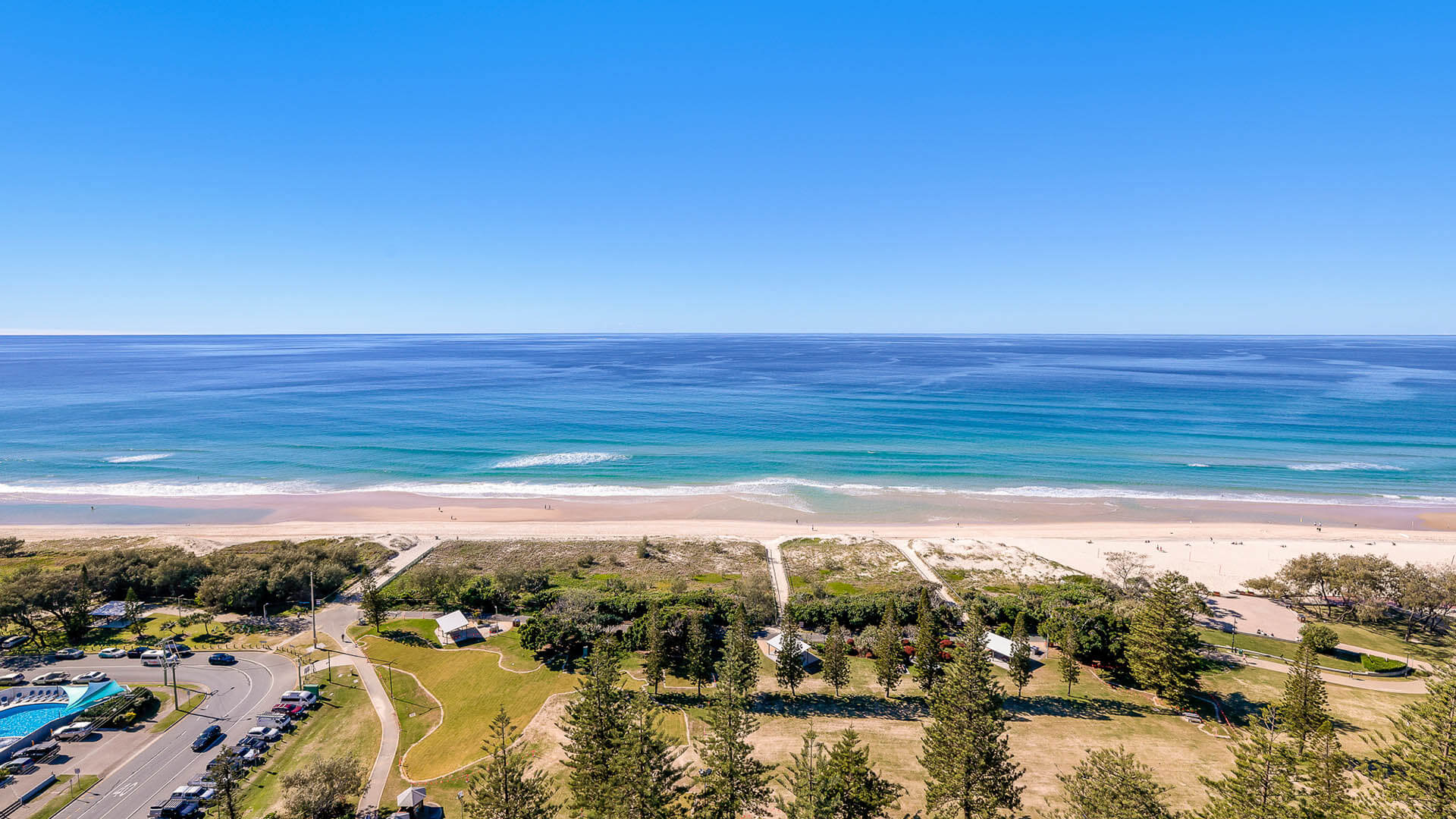 Uninterrupted Ocean views overlooking the coastline, parklands, and patrolled beach access. 
